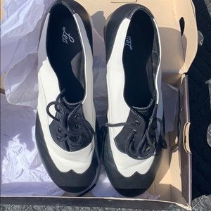 Black and white Leo Tap shoes